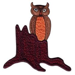 Whimsical owl in brown and orange perched on a reddish-brown tree stump, showcasing earthy charm.