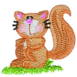 Cute squirrel in warm browns with pink accents sitting on vibrant green grass. Perfect for quilting.