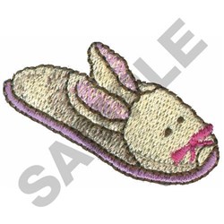 Bunny slipper with soft light-colored fur, playful pink bow and ears, perfect for whimsical Easter celebrations.