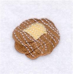 Decorative patch with a realistic textured appearance, featuring intricate brown, yellow, and cream threads.