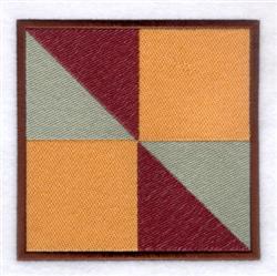Geometric pattern quilting design featuring a minimalist square divided into colorful triangles in maroon, orange, and green,