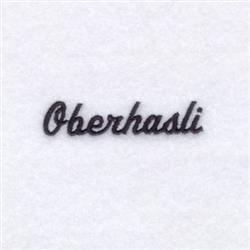 Elegant script text 'Oberhasli' embroidered in black thread on soft white fabric, showcasing minimalist design.
