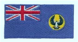 Flag of an unspecified region with a blue background, showcasing a detailed British flag and a vibrant circular emblem.