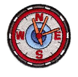 Vibrant compass design with a red outer ring, white face, bold cardinal points, and playful colors.