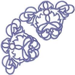 Floral motif with intricate purple thread and elegant curved lines, showcasing modern quilting style.
