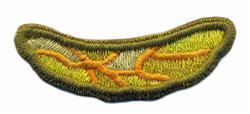 FSL stylized leaf in vibrant green and yellow, accented with orange detailing, features an intricate outline.