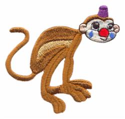 Cartoon monkey with brown fur and colorful red and blue markings, wearing a playful party hat for a festive birthday theme.