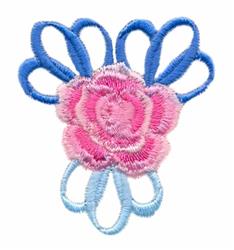 Applique flower featuring a central pink rose with soft gradients and playful blue loops, perfect for spring.