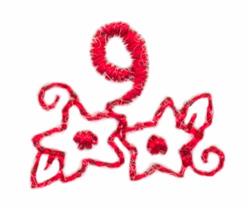Redwork number 9 adorned with playful swirls, flanked by two whimsical white flowers with red centers, perfect for holidays.