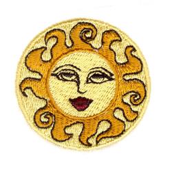 Smiling sun with brown and burgundy facial features, playful swirl designs, on cheerful yellow background.