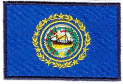 State flag featuring a detailed ship emblem encircled by a gold laurel wreath on a vibrant blue background.