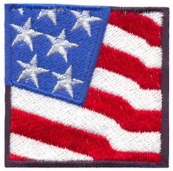 Traditional embroidered patch of the United States flag with vibrant red stripes, white stars, and a blue field, perfect for