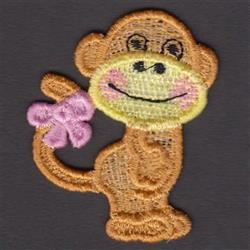 FSL monkey with brown fur and a pink bow, smiling playfully against a dark background.