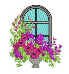 Vibrant bouquet of flowers in a decorative vase by a large black-framed window with blue panes.