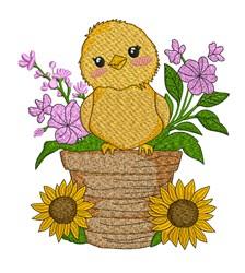 Whimsical chick perched on a textured pot, surrounded by purple flowers and sunflowers, perfect for spring décor.