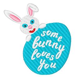 Cheerful bunny peeking from behind a blue Easter egg with vibrant text saying 'some bunny loves you'.