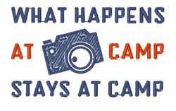 Playful text design featuring a camera graphic, bold navy and orange letters stating 'WHAT HAPPENS AT CAMP STAYS AT CAMP'.