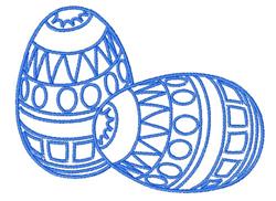 Decorative eggs with geometric patterns in blue thread, showcasing circles and bands for festive Easter decor.