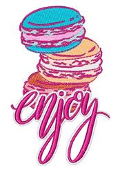 Colorful macaron stack in blue, pink, and yellow with 'enjoy' in pink cursive, cheerful dessert design.