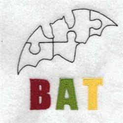 Playful bat in black puzzle pieces with bold letters spelling 'BAT' in red, green, and yellow for Halloween.
