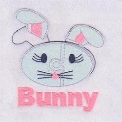 Playful bunny head applique with pink detailing, cheerful expression, and bold pink text, perfect for Easter.
