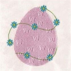 Playful pink egg with butterfly motifs, surrounded by blue flowers and green vines, perfect for Easter decor.