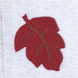 Bold red leaf with gold thread detailing on veins, set against a white background, in elegant autumn embroidery style.