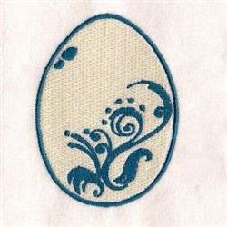 Decorative egg with swirling floral patterns in blue on a cream background, perfect for Easter-themed quilting.
