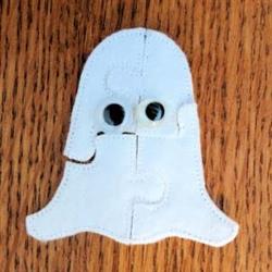 Cute ghost with a wavy bottom edge and black eyes, perfect for playful Halloween decor.