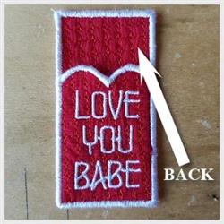 Embroidered patch with a red background displaying 'LOVE YOU BABE' in white text, featuring a heart detail.