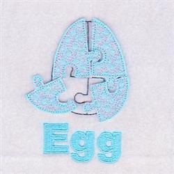 Puzzle piece egg in soft blue with polka dots, featuring 'Egg' text below. Perfect for playful Easter designs.