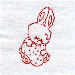 Redwork bunny with a playful red outline, sitting and holding a cute polka-dotted object for Easter.