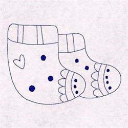 Redwork socks with blue dots and scalloped edges, featuring a charming heart, perfect for holiday gifts.