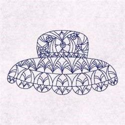 Redwork intricate hat design featuring delicate floral patterns and scalloped edges, elegantly outlined in blue.