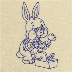 Redwork rabbit with a hammer beside a toolbox, wearing overalls and a checkered shirt, inviting style.