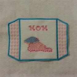 Playful seashell with pink and blue hues surrounded by 'MOM' text, framed by a light blue border for Mother's Day.
