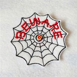 Playful spider web with red 'BEWARE' text and cheerful yellow center, perfect for Halloween décor.