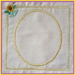 Ornamental floral design featuring a sunflower in a delicate circular frame with yellow stitching and green accents.
