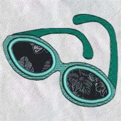 Playful sunglasses with green frames and dark lenses featuring a leaf pattern, perfect for vibrant fashion accessories.