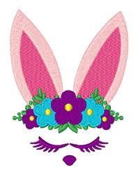 Bunny head with pink ears and a bright floral crown, featuring vibrant blue and purple flowers, perfect for Easter.