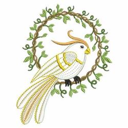 Applique bird with delicate white feathers rests in a circular twig frame surrounded by green leaves.