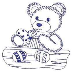 Redwork bear holding a cookie on a log, outlined in blue with a striped outfit, surrounded by decorative eggs for Easter.