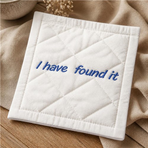 White Towel with Blue Phrase